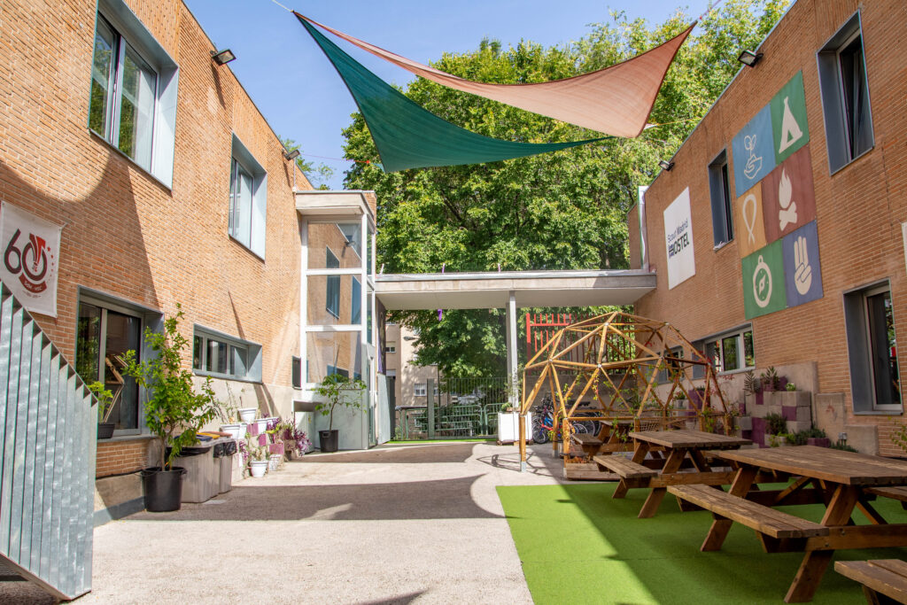 Renovated terrace with awnings and picnic tables